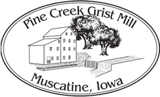 Outline of the mill building with text reading Pine Creek Grist Mill Muscatine Iowa